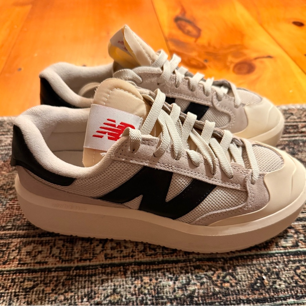 New Balance Off-White and Black Sneakers